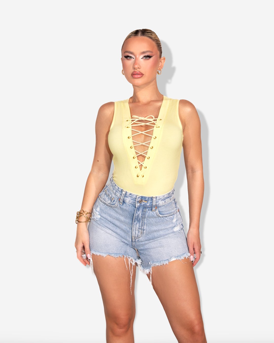 Denim shorts with asymmetrical raw and distressed hem |Blue