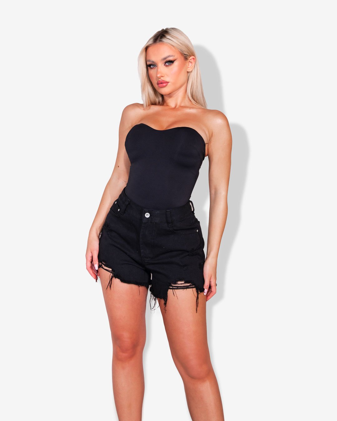 High-waisted distressed denim shorts | Black