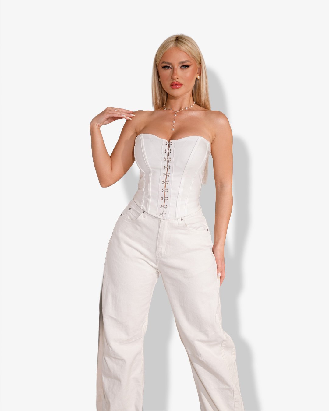 Strapless corset-style top with closure | White